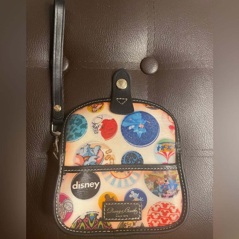Disney Dooney and Bourke Disney Buttons Black Sketch Wristlet